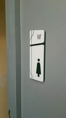 ป้ายห้องน้ำสตรี ภายในโครงการ Hallmark Charan 13 by wesignlab