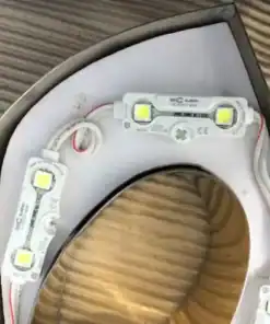 ชิ้นส่วนอักษรป้ายไฟออกหลังหน้า บ้านระฆังเพชร เขาใหญ่