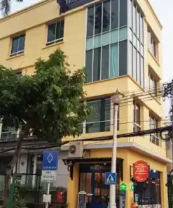 ป้ายบนอาคาร DINSO HOME